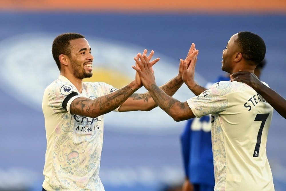 Gabriel Jesus (L) scored as Man City won 0-2 at Leicester. AFP
