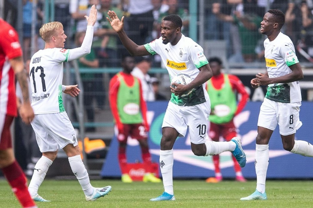 Thuram (C) was the hero for Gladbach against Dusseldorf. AFP