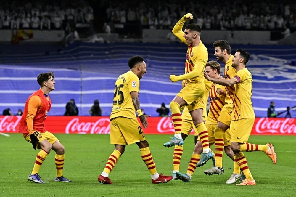 Aubameyang celebrates his second goal in Barcelonas 4-0 thrashing of Real Madrid. AFP