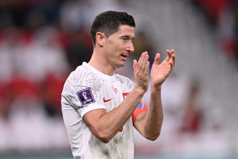 Lewandowski refused to confirm if he had played his last WC game. AFP