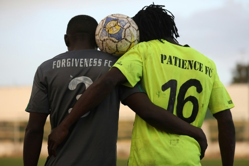 Captains of Forgiveness and Patience FC together represent new-found peace in the town of Jos. AFP