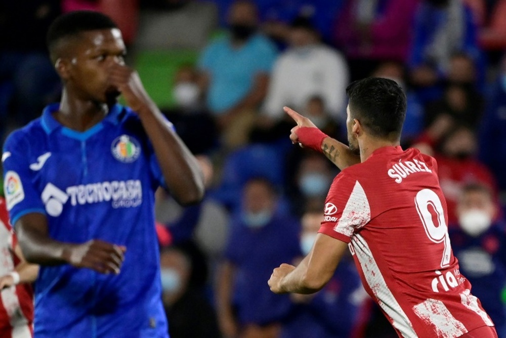 Luis Suarez scored a late double for Atletico. AFP
