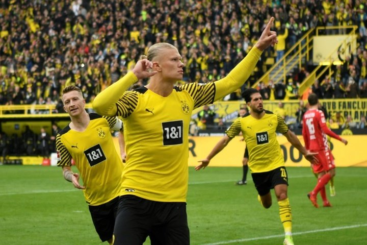 Haaland scores brace on comeback as Dortmund go top
