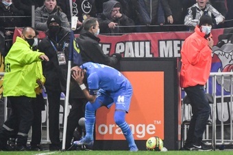Dimitri Payet was struck on the head by a bottle of water. AFP