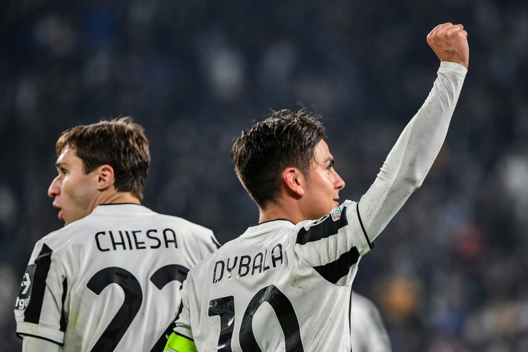 dybala scores twice as juventus ease into champions league last 16