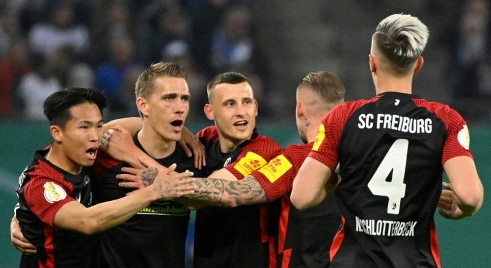 Nils Petersen celebrates Freiburgs opening goal. AFP