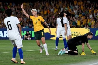 Veteran Michelle Heyman scored four first-half goals as Australia crushed Uzbekistan 10-0 Wednesday to emphatically seal their place at the Paris Olympics.