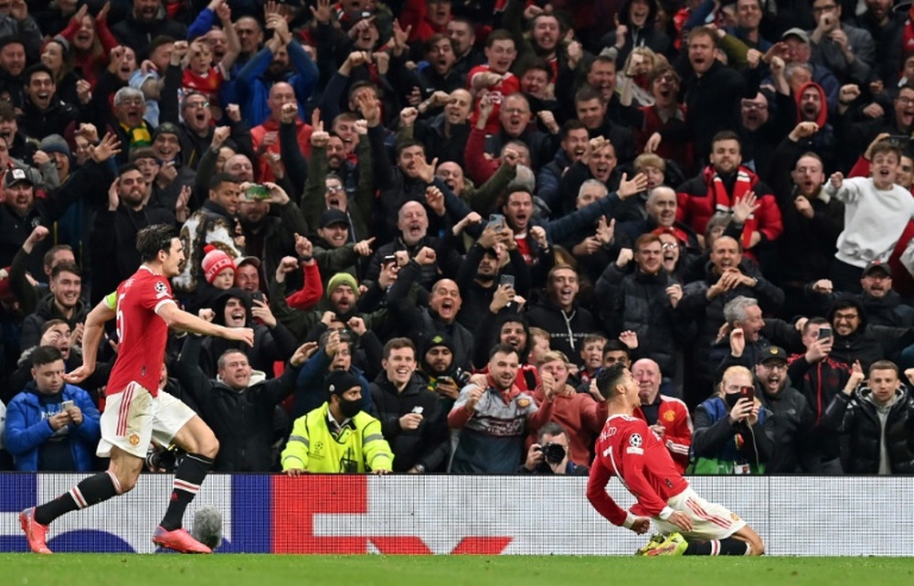 Cristiano Ronaldo (R) was once again the hero for Man Utd. AFP