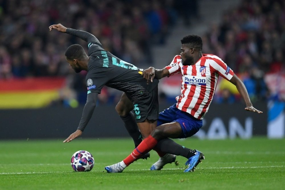 Arsenal are reportedly set to meet Thomas Parteys buyout clause from Atletico Madrid. afp_en