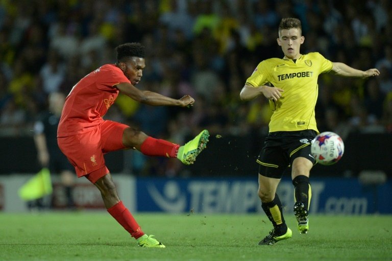 Liverpool cruise, Chelsea squeeze in League Cup