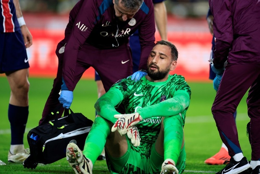 Gianluigi Donnarumma had to be replaced in the first half after sustaining cuts to his face. AFP