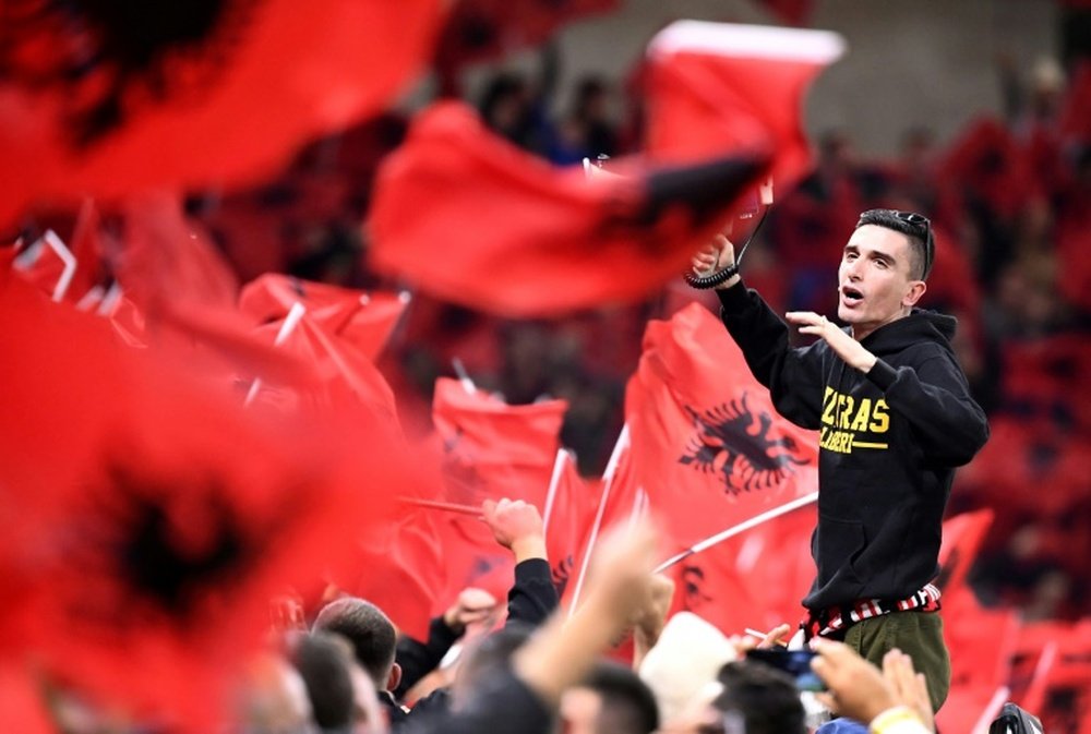 Albanian fans booed the French anthem after France's error in the game in Paris. AFP