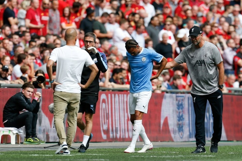 Manchester City winger Leroy Sane was forced off with a knee injury during Sunday's victory. AFP