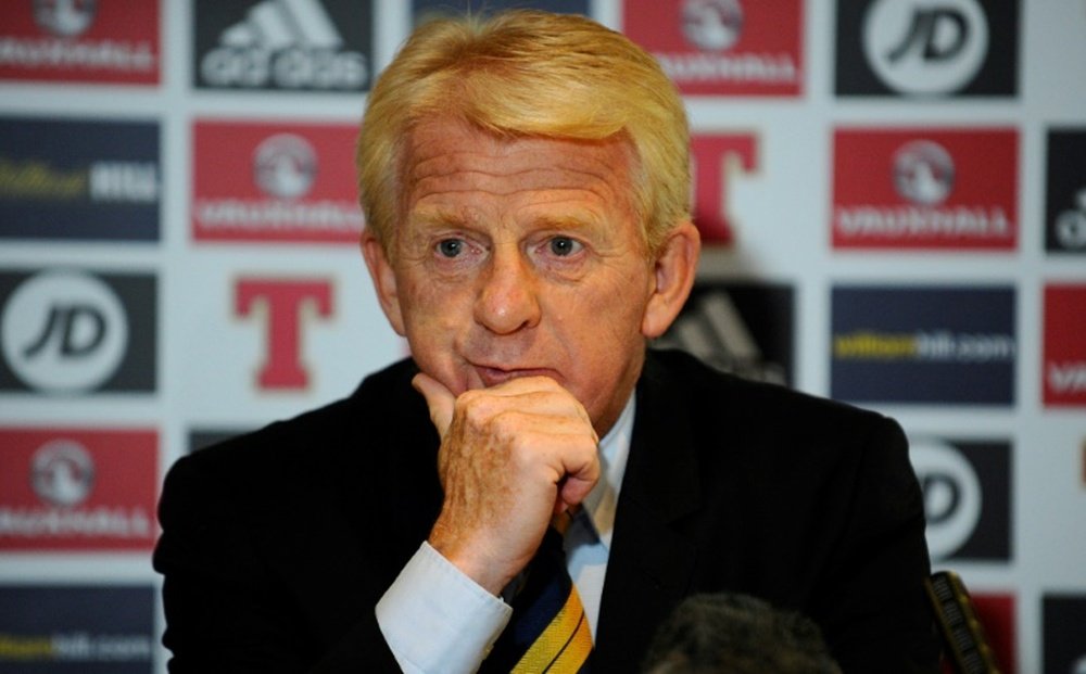 Strachan has demanded Scotland get to train on Lithuania's plastic pitch. AFP