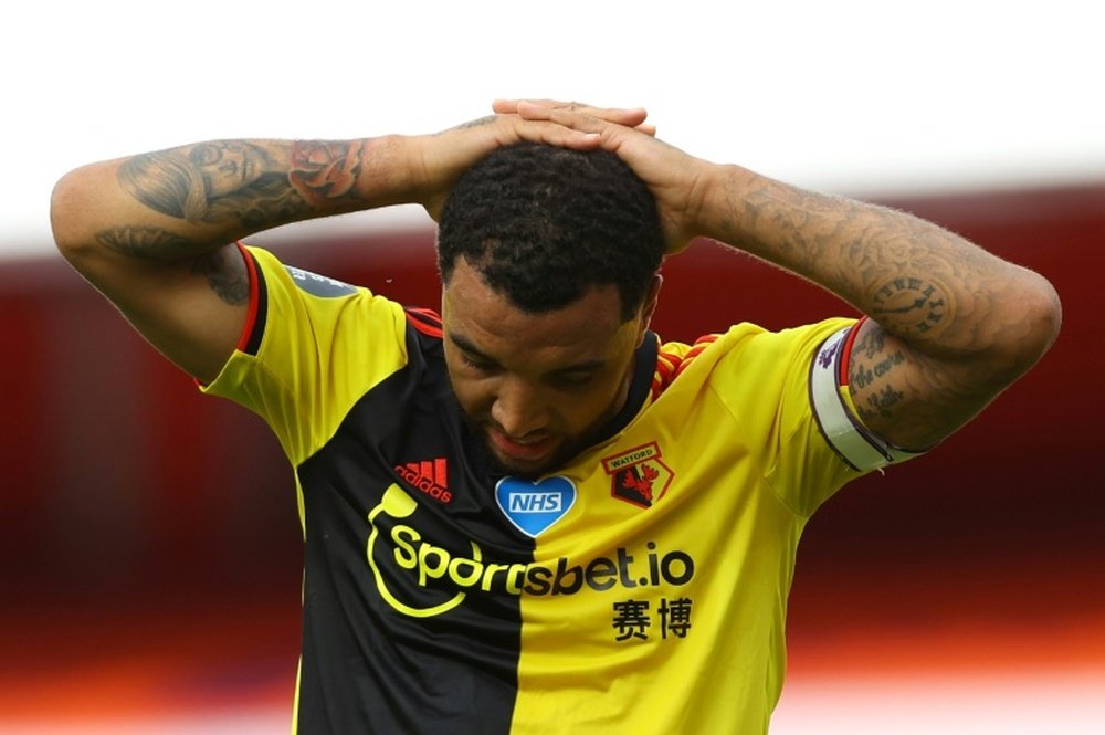 Watford, Bournemouth feel relegation pain as Villa party. AFP