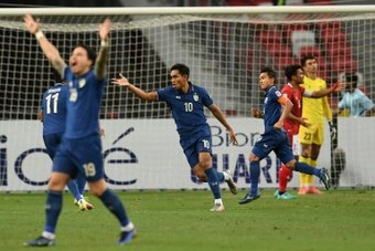 Songkrasin (C) scored twice as Thailand won 4-0 in the first leg. AFP