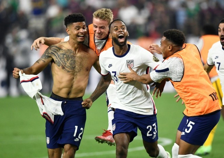 Miles Robinson (L) scored in extra-time to give the USA a 1-0 win in the Gold Cup final. AFP