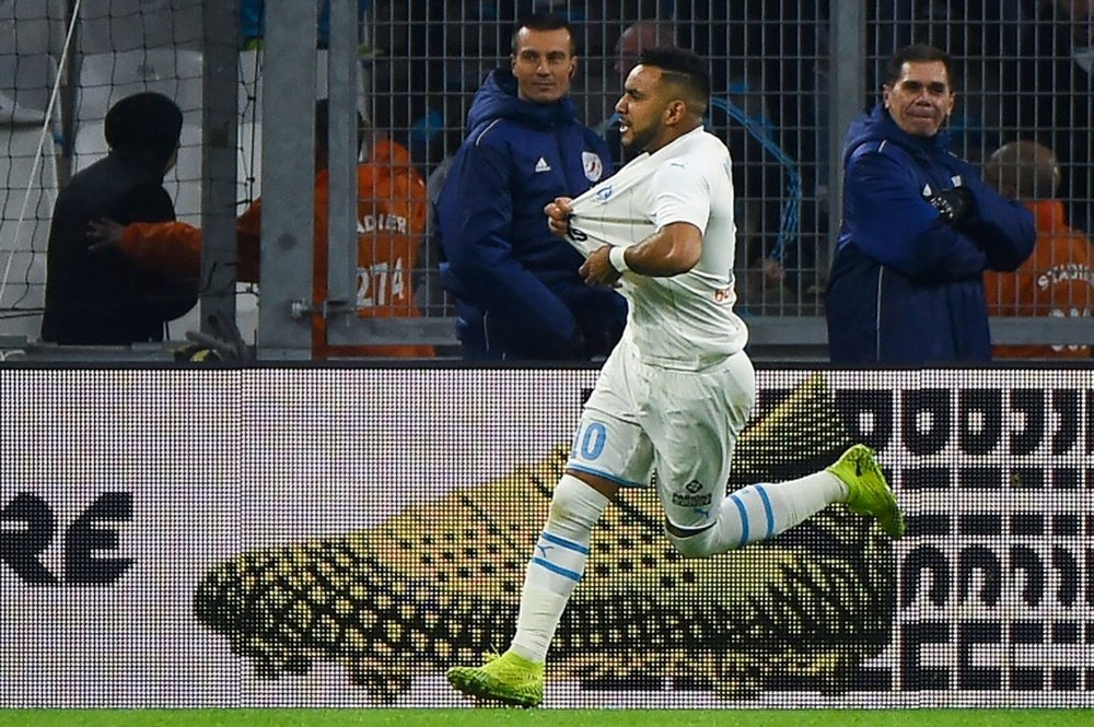 Payet fires Marseille to fiery derby win after fans attack Lyon bus. AFP