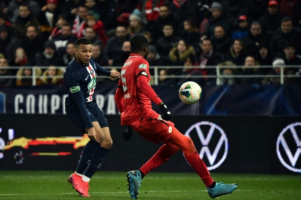 Mbappe (L) and PSG cruised to victory over Dijon in the French Cup QF. AFP