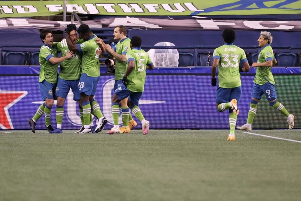 Defending champion Sounders beat Dallas in MLS playoffs. AFP