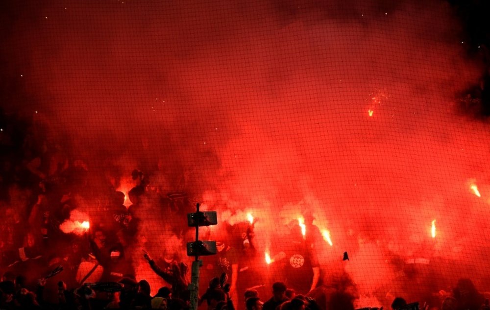 Saint-Etienne hit with fan ban after PSG fireworks display. AFP