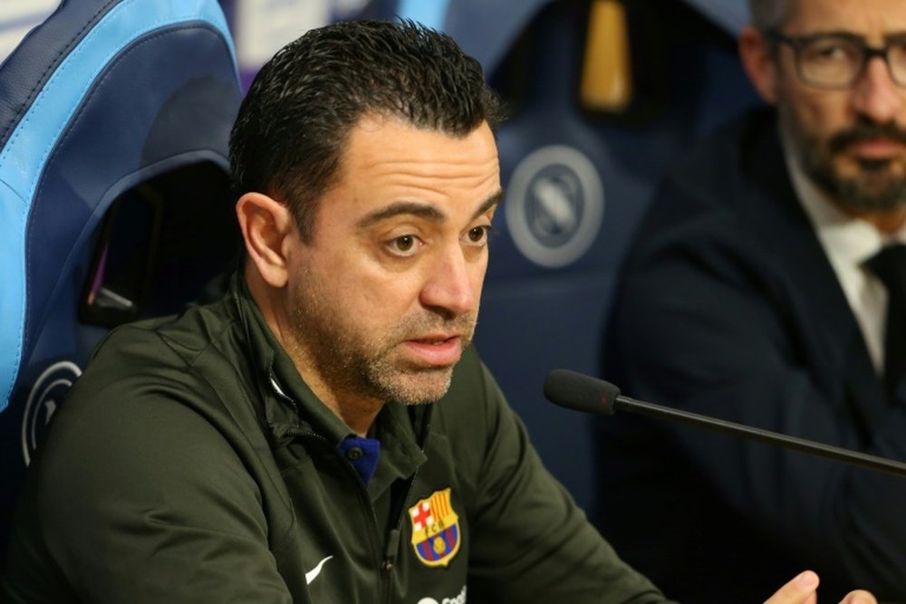 Xavi does not see Barca as favourites against Napoli. AFP