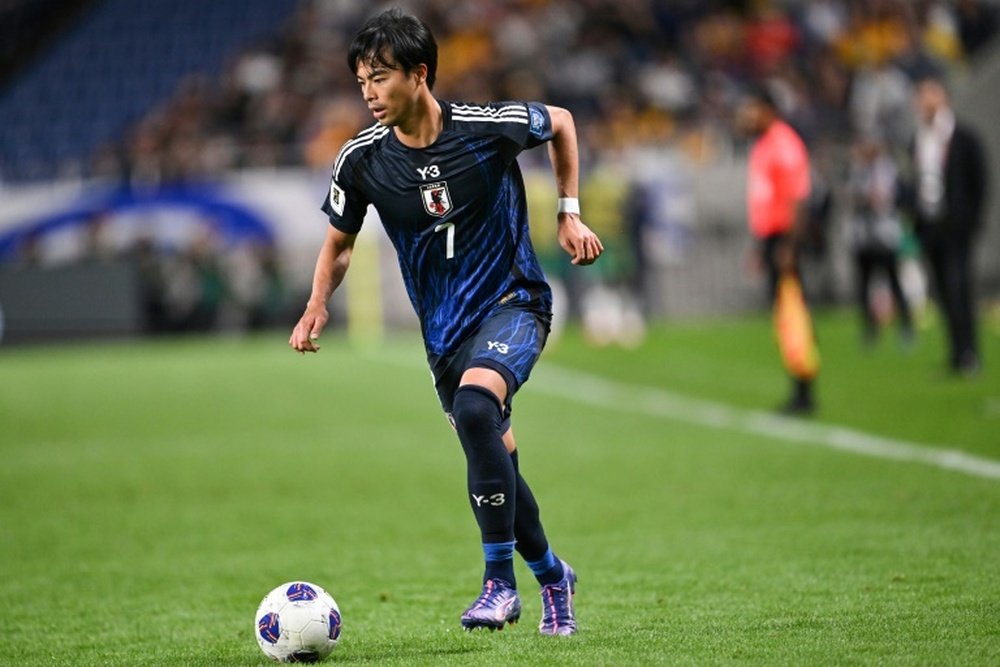 Japan are nine points clear of Australia at the top of Group C. AFP