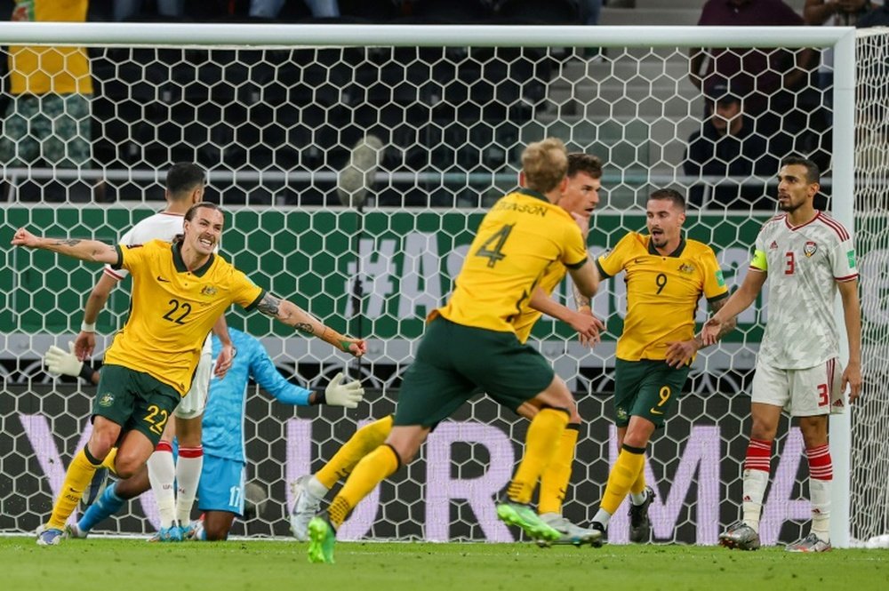 Australia coach wants more from team after World Cup playoff win. AFP
