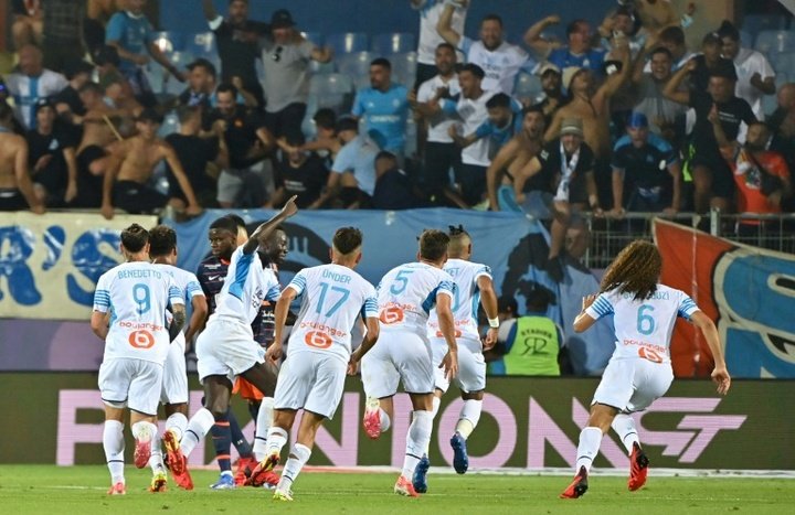 Bottles thrown, match held-up as Marseille fight back