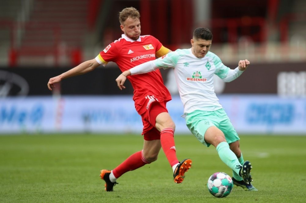 Norwich have signed Milot Rashica (R) from second tier Werder Bremen. AFP