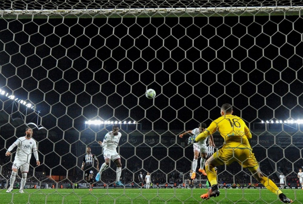 Paris Saint-Germain's Marquinhos scores his teams third goal against Angers. AFP