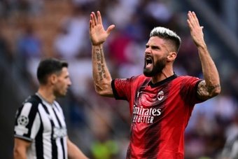 AC Milan will defend their two-point Serie A lead on Sunday night when they face Juventus, a huge match which threatens to be overshadowed by a gambling scandal rocking Italian football.