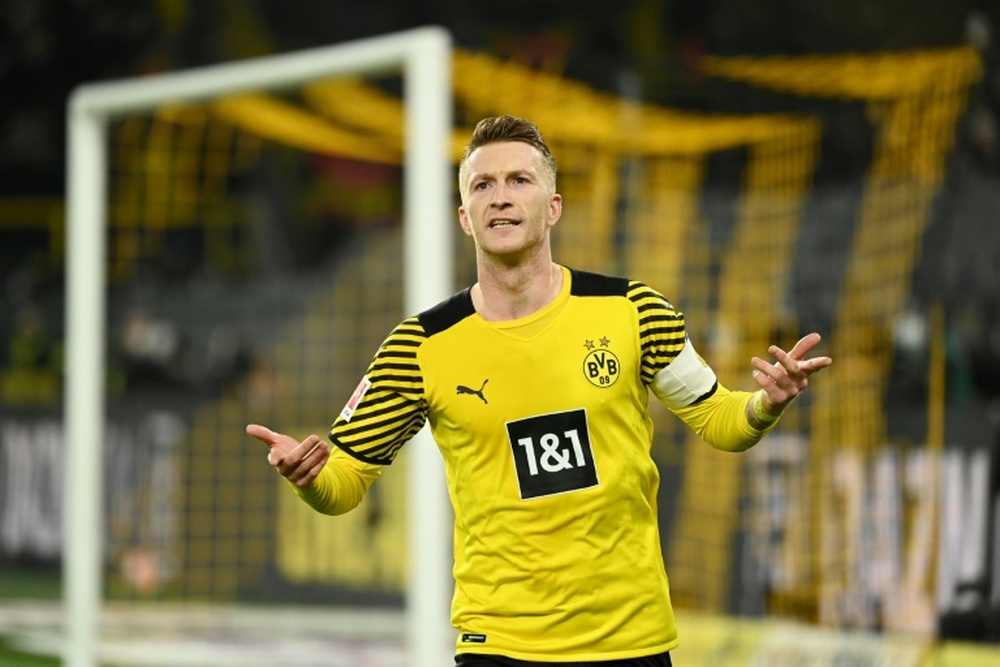 Marco Reus celebrates scoring the winning goal in Saturdays 2-1 victory over Stuttgart. AFP