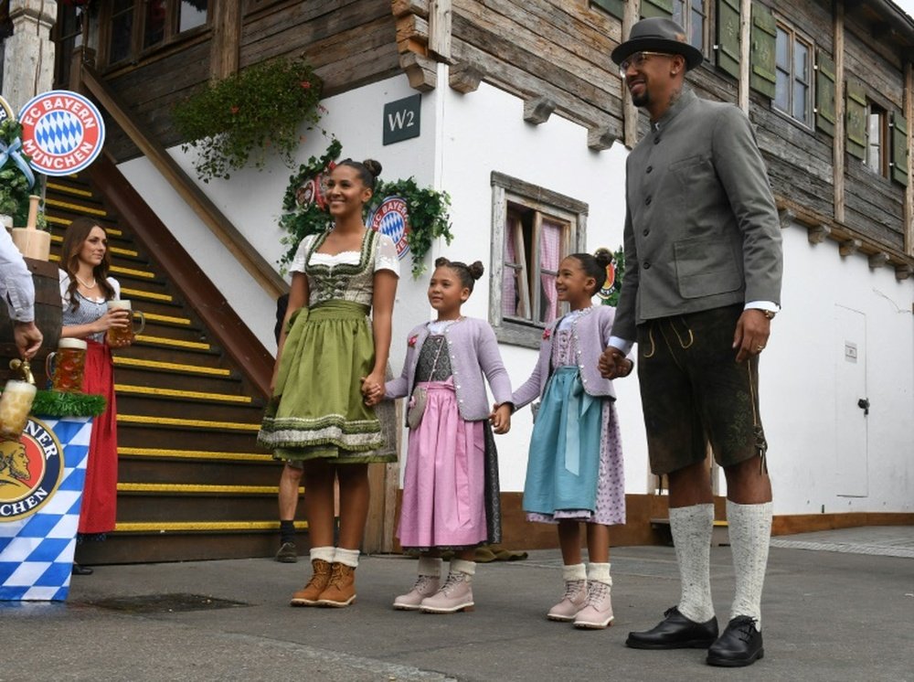 Jerome Boateng with his family on a visit to the Munich beer festival. AFP