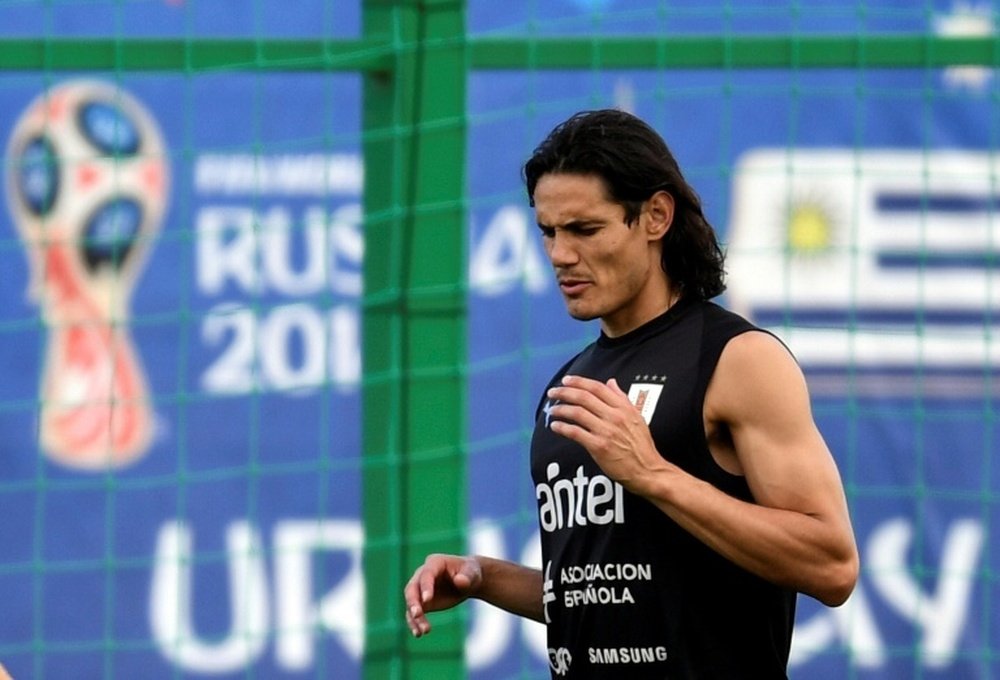 Cavani trained alone. AFP