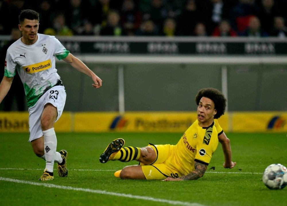 Axel Witsel (R) will miss Dortmund's game with Wolfsburg on Saturday. AFP