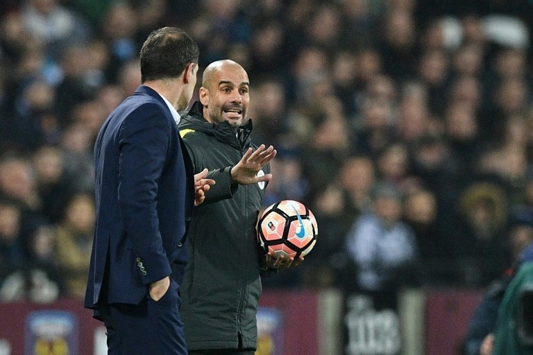 Smiles better for Guardiola in City FA Cup stroll