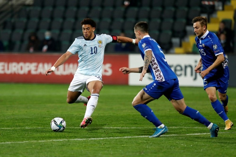 Che Adams scored as Scotland secured a 2022 World Cup qualifying playoff in Moldova. AFP
