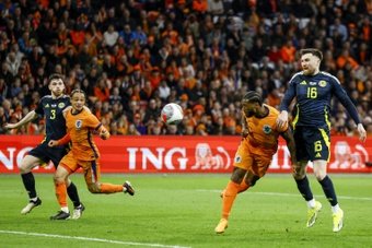 Netherlands scored three times in the closing stages to inflict a crushing 4-0 defeat on Scotland in Friday's friendly.