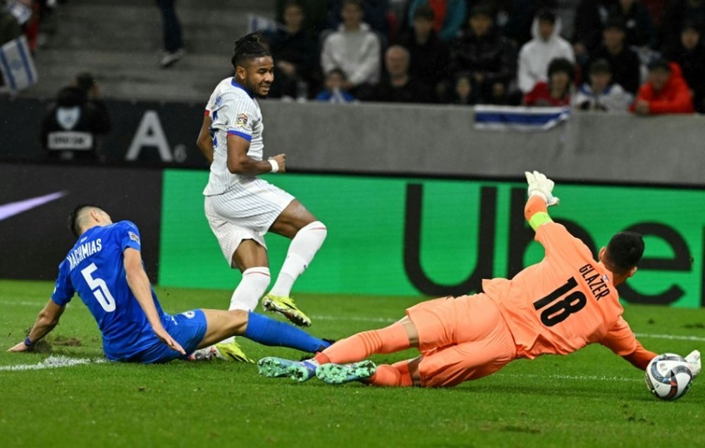 Christopher Nkunku coolly slotted in his first goal for France. AFP