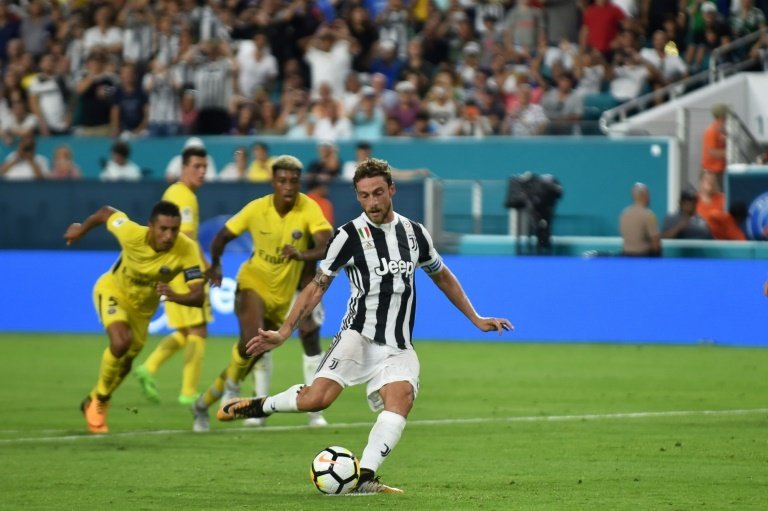 Claudio Marchisio scored twice as Juve beat PSG 3-2. AFP