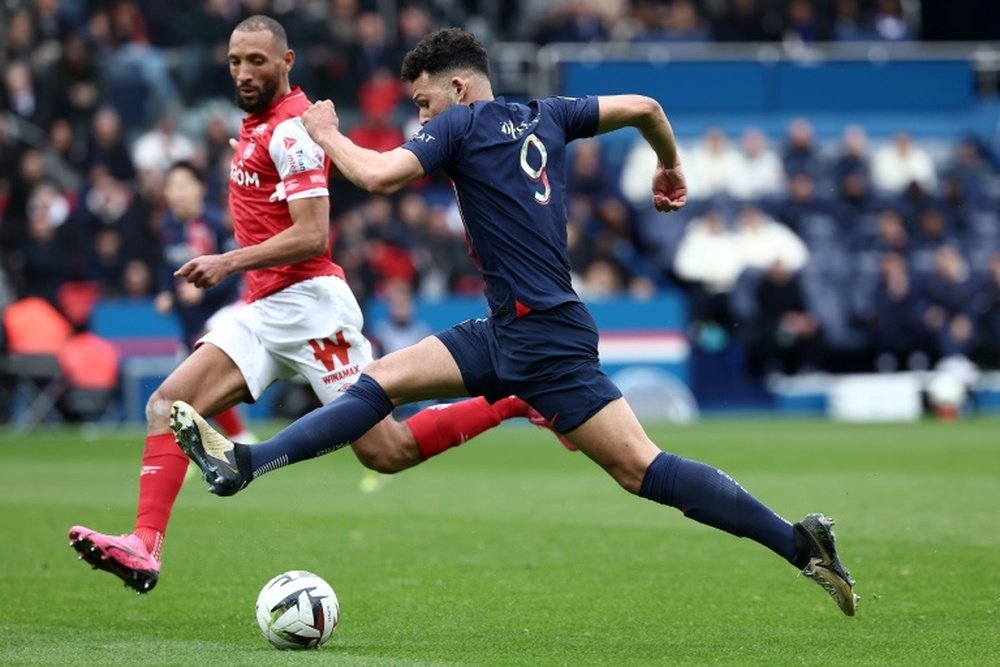 PSG's Goncalo Ramos (R) took on Reims captain Yunis Abdelhamid during the 2-2 draw in Ligue 1. AFP