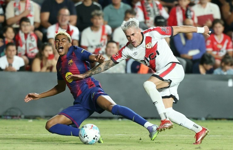 Barca hold on for draw against impressive Rayo