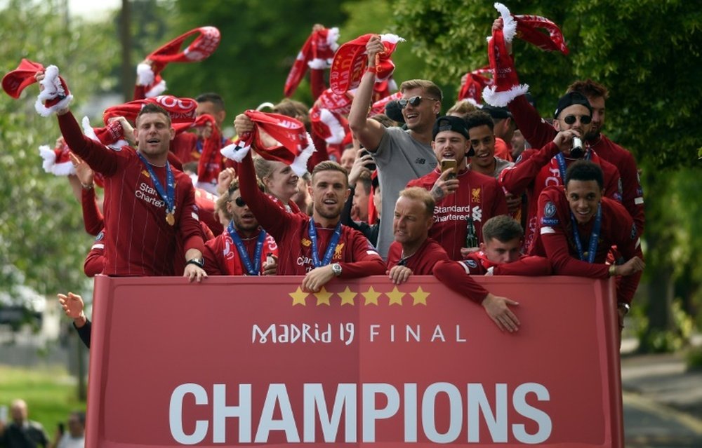 Liverpool eye Premier League title as barometer of success. AFP