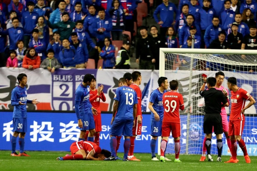 China has seen a surge in red cards this season. AFP