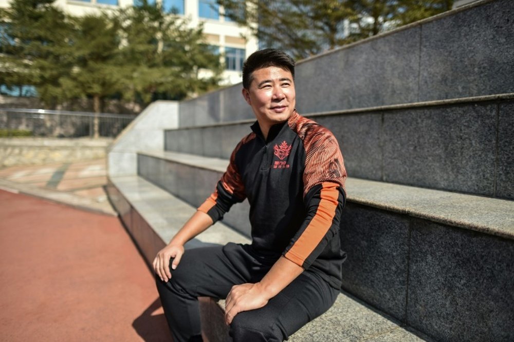 Former Man Utd star Dong finds calling in coaching Chinese kids. AFP