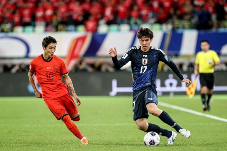 Ruthless Japan beat China to move to closer to World Cup qualification