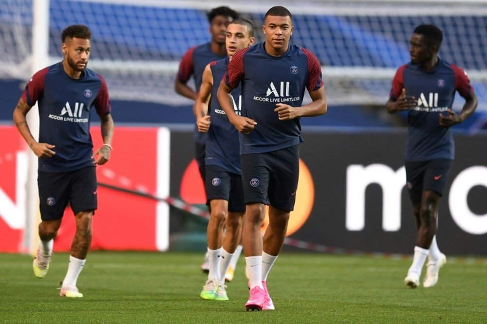 Mbappe eager to 'go down in history' with PSG Champions League win. AFP