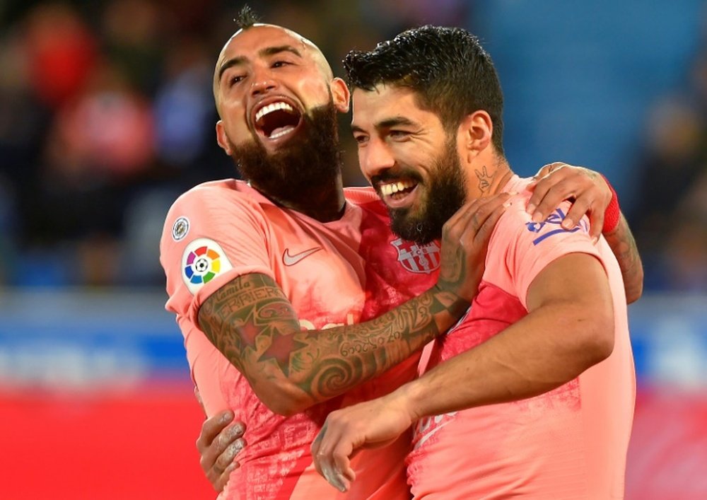 Luis Suarez scored the penalty to make it 2-0. AFP
