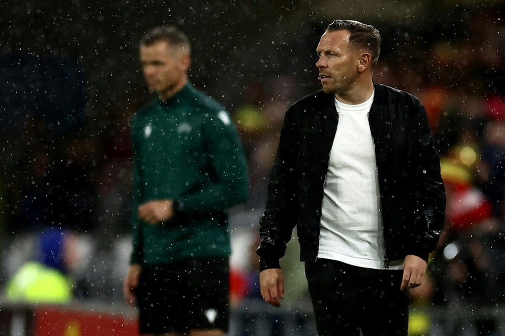 Bellamy was unable to mastermind a debut victory in rain-lashed Cardiff. AFP